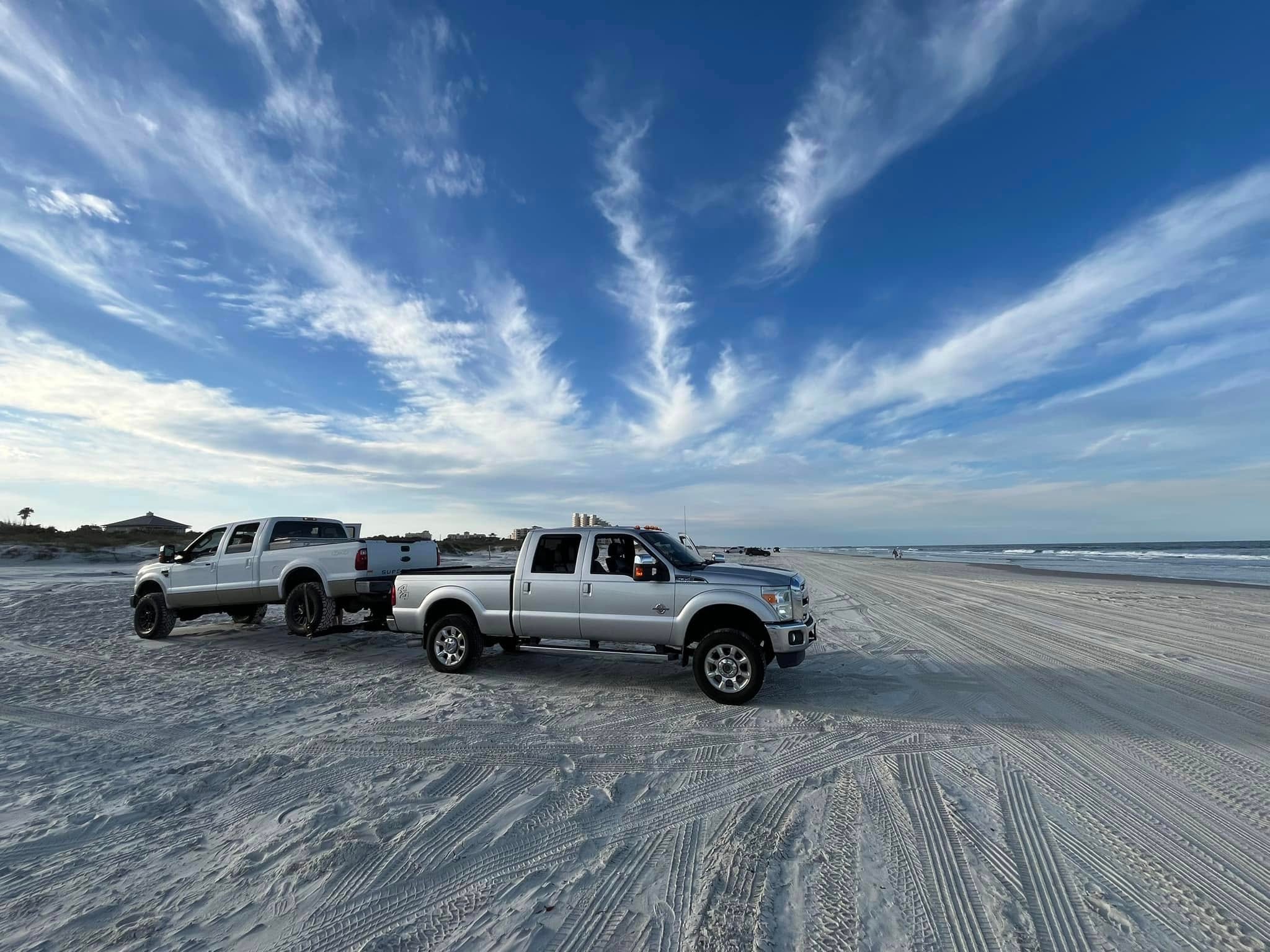 JF Drives trucks on the beach near Bethune Beach in New Smyrna Beach, Florida.