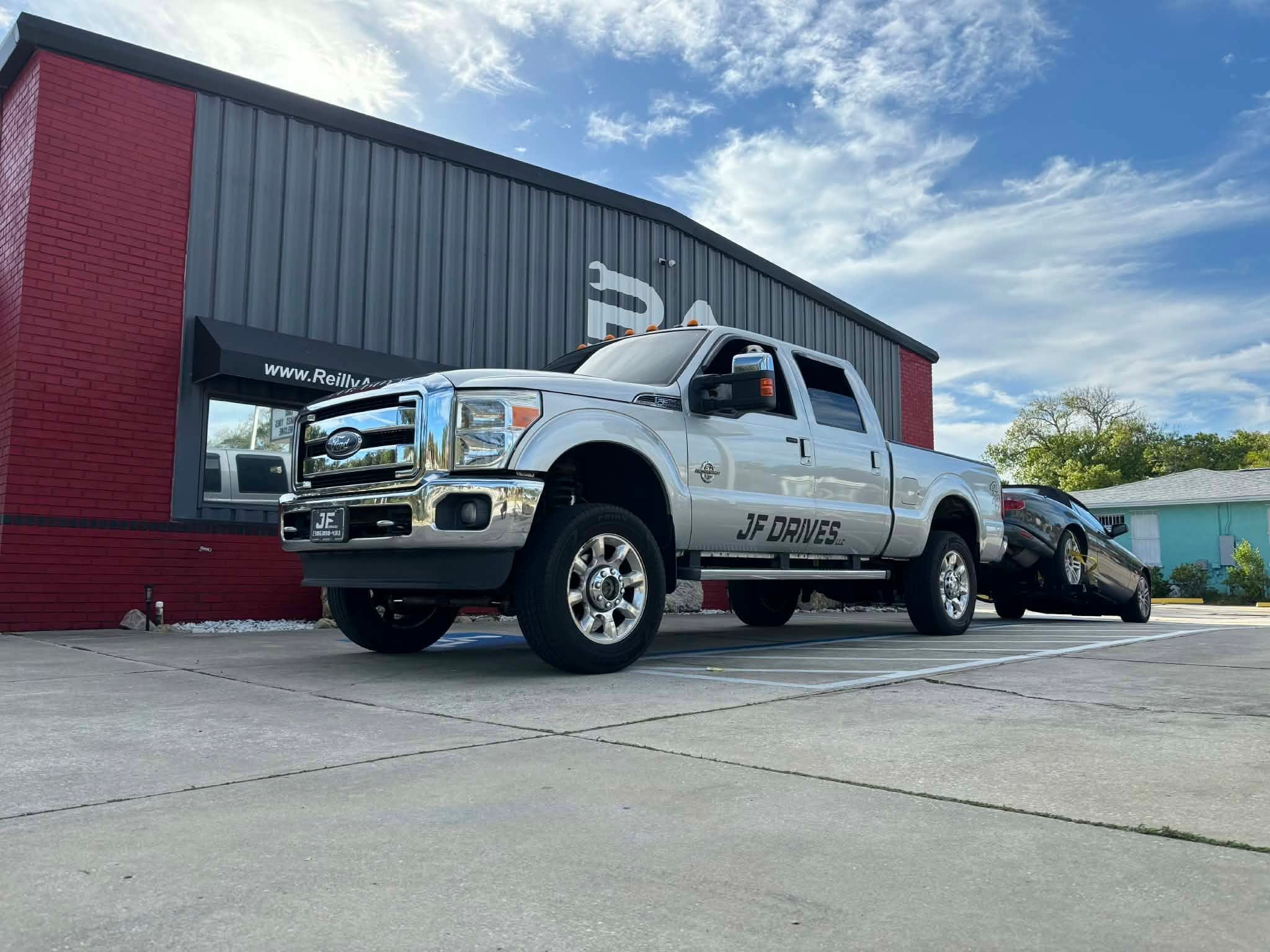 JF Drives truck parked at a facility